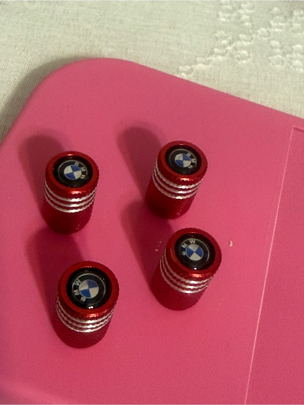 BMW Red Metallic Tire Valve Stem Caps with Logo (Set of 4)